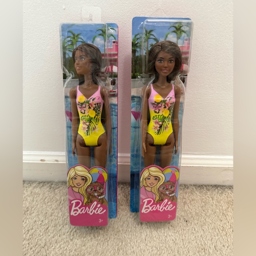 Two Barbie Dolls